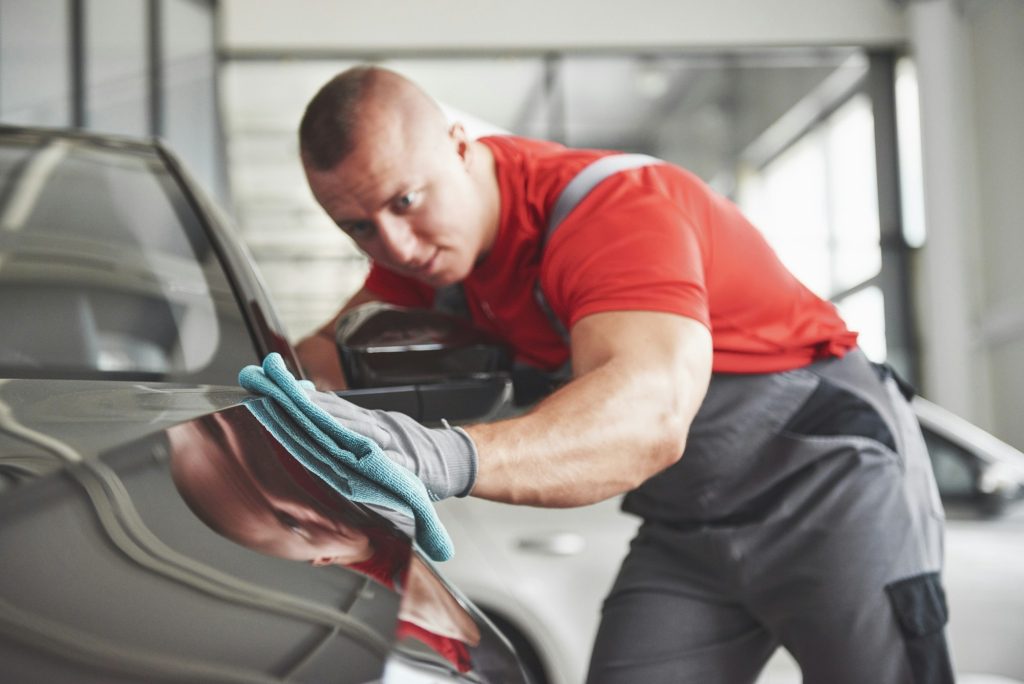 Professional cleaning and car wash in the car showroom